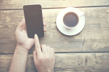 woman hand coffee and phone