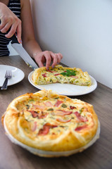 Homemade Spinach and Bacon Egg Quiche in a pie crust. French cuisine