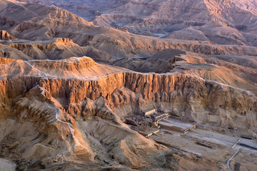 Obraz premium Egypt. Aerial view over the West Bank of Luxor. Deir el-Bahari - the Mortuary Temple of Hatshepsut and fragment of the Valley of the Kings