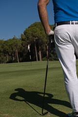 golf player portrait from back