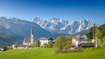 Fototapeta na wymiar Church Gosau in front of Gosaukamm, Salzkammergut, Upper Austria, Austria