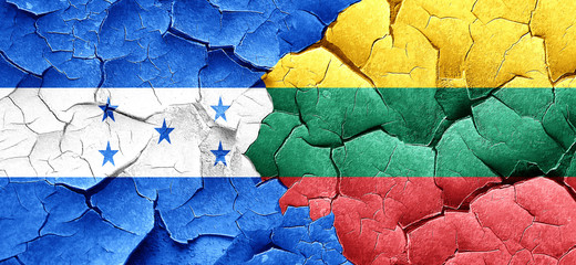 Honduras flag with Lithuania flag on a grunge cracked wall