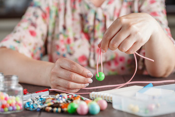 Woman making home craft art