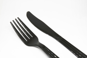 black plastic fork and knife