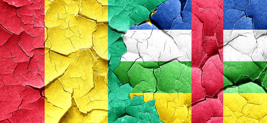 Guinea flag with Central African Republic flag on a grunge crack