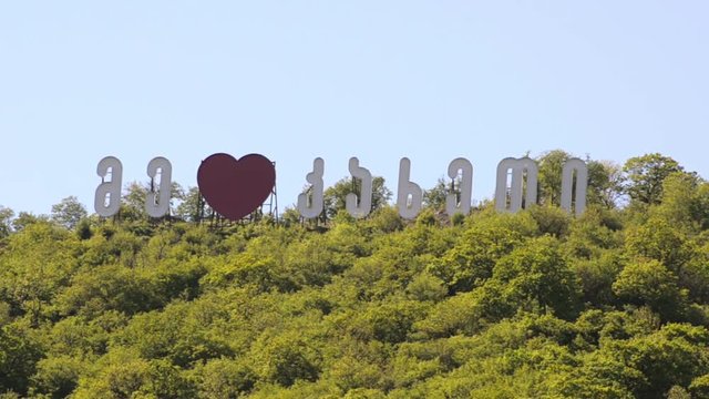 Large Georgian letters on top of a hill among the greenery I love Kakheti
