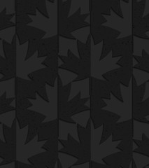 Black textured plastic maple leaves half and half