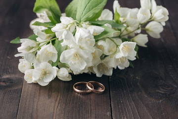 wedding bouquet with beautiful gold wedding rings
