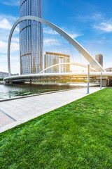 empty tiled floor and urban skyline,tianjin china.