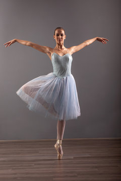 beautiful ballerina in point technique,posing