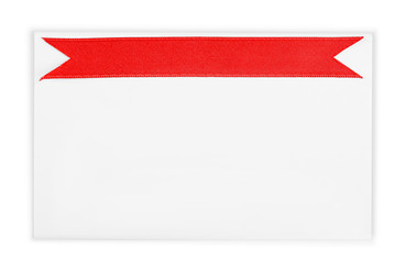 Note card with red ribbon on white background