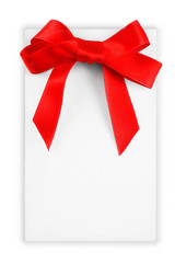 Note card with ribbon bow on white background