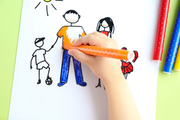 Small girl painting on cute picture