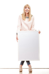 woman holding blank presentation board