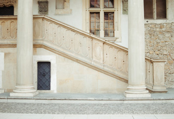 Fototapeta na wymiar Staircase of stone and two beige column