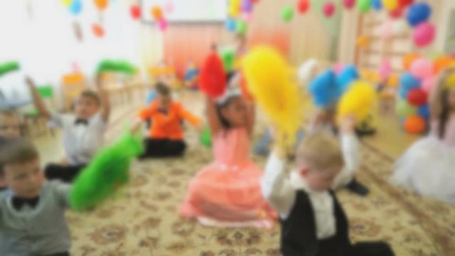 Children dance at a kindergarten
