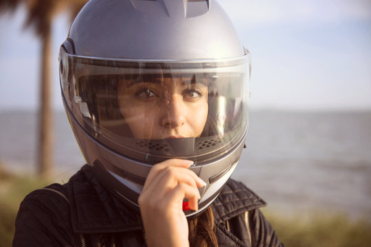 Close-up Of Beautiful Woman Wearing Helmet