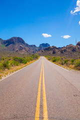 Beautiful cinematic view of the road under the blue cloudless sky in America