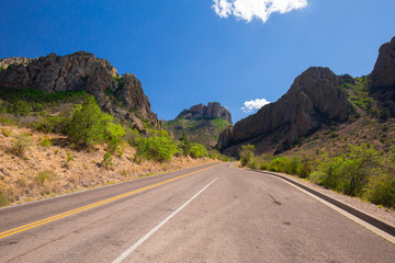Beautiful cinematic view of the road under the blue cloudless sky in America