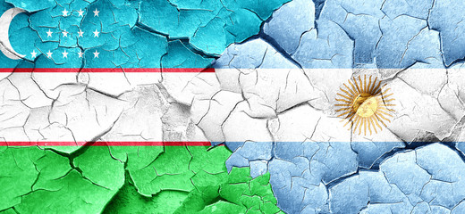 Uzbekistan flag with Argentine flag on a grunge cracked wall
