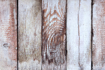 Old shabby wooden planks with cracked paint background