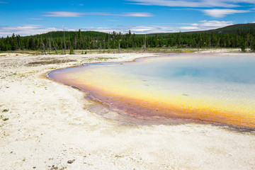 Beautiful cinematic view of nature landscape in the American West under the blue cloudy sky. Geyser.