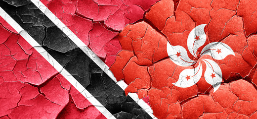 Trinidad and tobago flag with Hong Kong flag on a grunge cracked