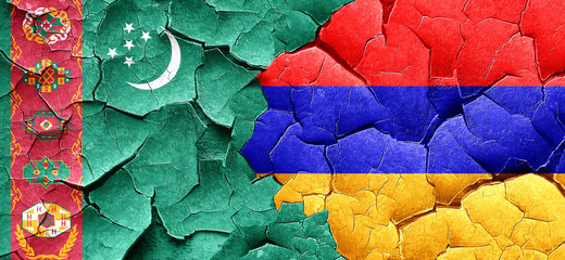 Turkmenistan flag with Armenia flag on a grunge cracked wall