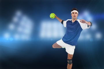 Portrait of sportsman throwing a ball against composite image of spotlight 