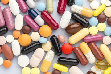 Pharmaceutical background of colorful pills and drugs