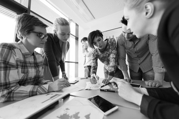 startup business team on meeting at modern office with sunset in