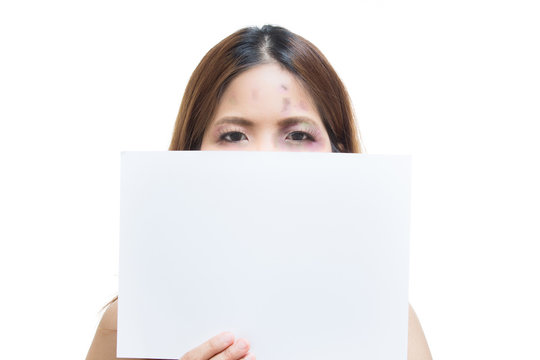 abused asian woman holding blank paper isolated on white