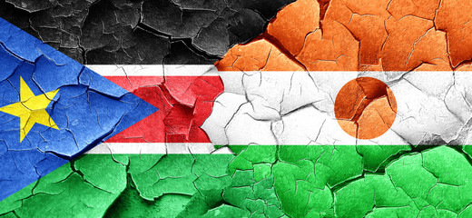 south sudan flag with Niger flag on a grunge cracked wall