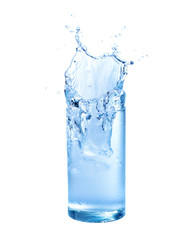 Water splashing out of a glass., Isolated white background.