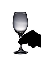 Hand holding glass of wine