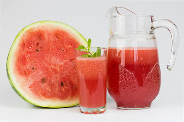 Close-up of fresh watermelon juice isolated on white background