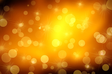 Blurred Golden Bokeh Background with sparkles and glitter.Golden