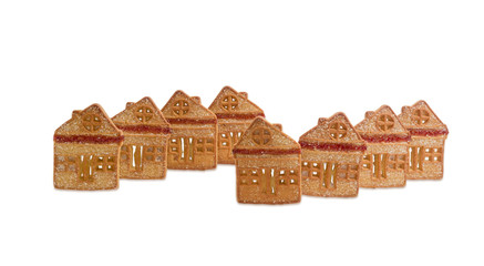 Cookies in the form of houses chalets on light background