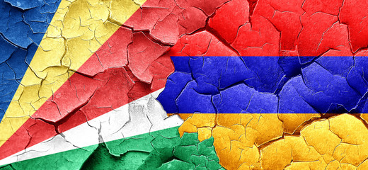 seychelles flag with Armenia flag on a grunge cracked wall
