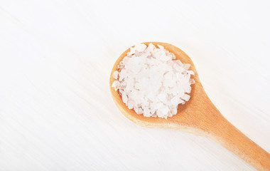 Wooden spoon with sea salt