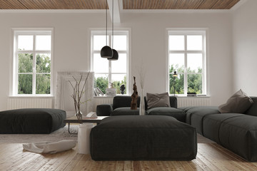 Three bare windows behind large black sofas