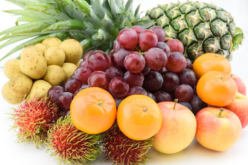 Assortment of exotic fruits isolated on white background