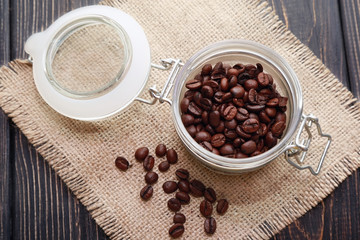 Roasted coffee beans in a glass jar