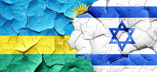 Rwanda flag with Israel flag on a grunge cracked wall