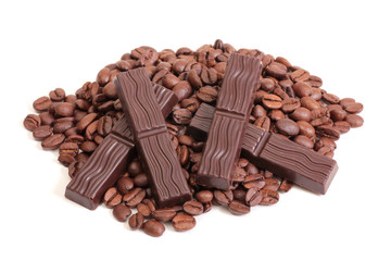Coffee beans and chocolate on a white background