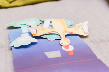 Little girl is cutting the paper