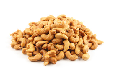 roasted cashew nuts with salt on white background