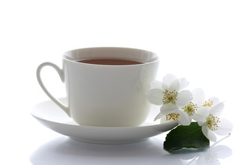 Obraz na płótnie Canvas cup of tea and jasmine