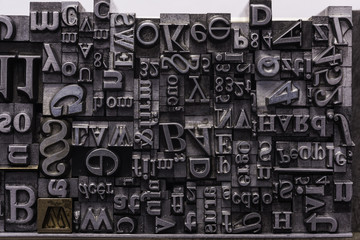 Metal Letterpress Types.
A background from many historic typographical letters in black and white...