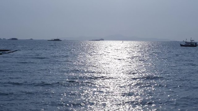 Pattaya beach panoramic evening observation hyperlapse agains sun